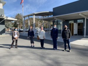 Kathryn Ishizu (Lamorinda Village), Dr. Rebecca Parish (Comprehensive Wellness), Suzy Pak (Community Volunteer), Dr. Denise Hilliard (Comprehensive Wellness), and Jonathan Katayanagi (City of Lafayette) walk the Stanley Middle School site to prepare for the weekend’s event.