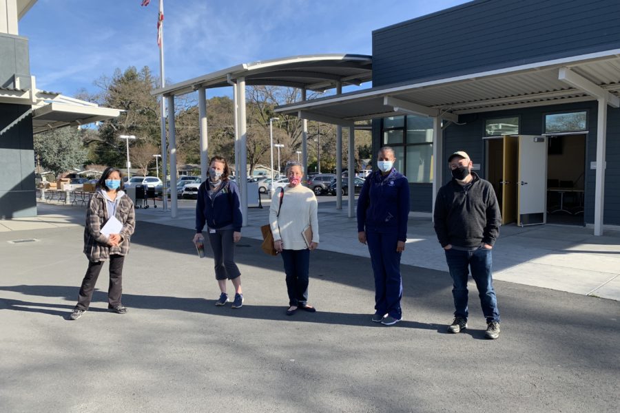 Kathryn Ishizu (Lamorinda Village), Dr. Rebecca Parish (Comprehensive Wellness), Suzy Pak (Community Volunteer), Dr. Denise Hilliard (Comprehensive Wellness), and Jonathan Katayanagi (City of Lafayette) walk the Stanley Middle School site to prepare for the weekend’s event.